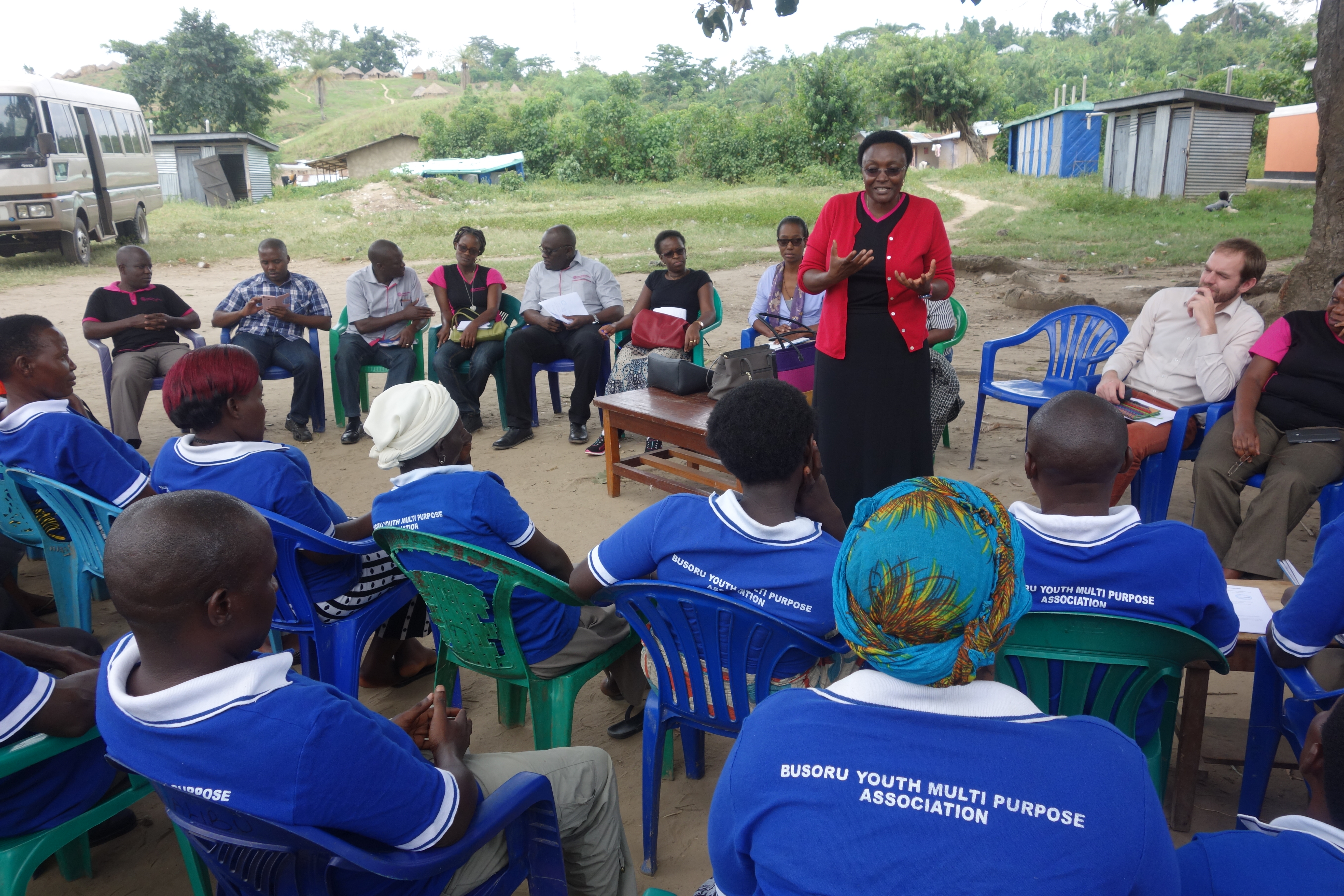 A Board Member of Soluti Finance East Africa encourages the association members’ on issues presented during the visit.